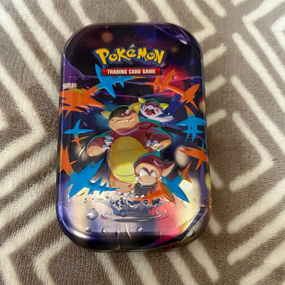 Pokémon Kangaskhan Trading Card Game Tin - Colorful Starburst Design